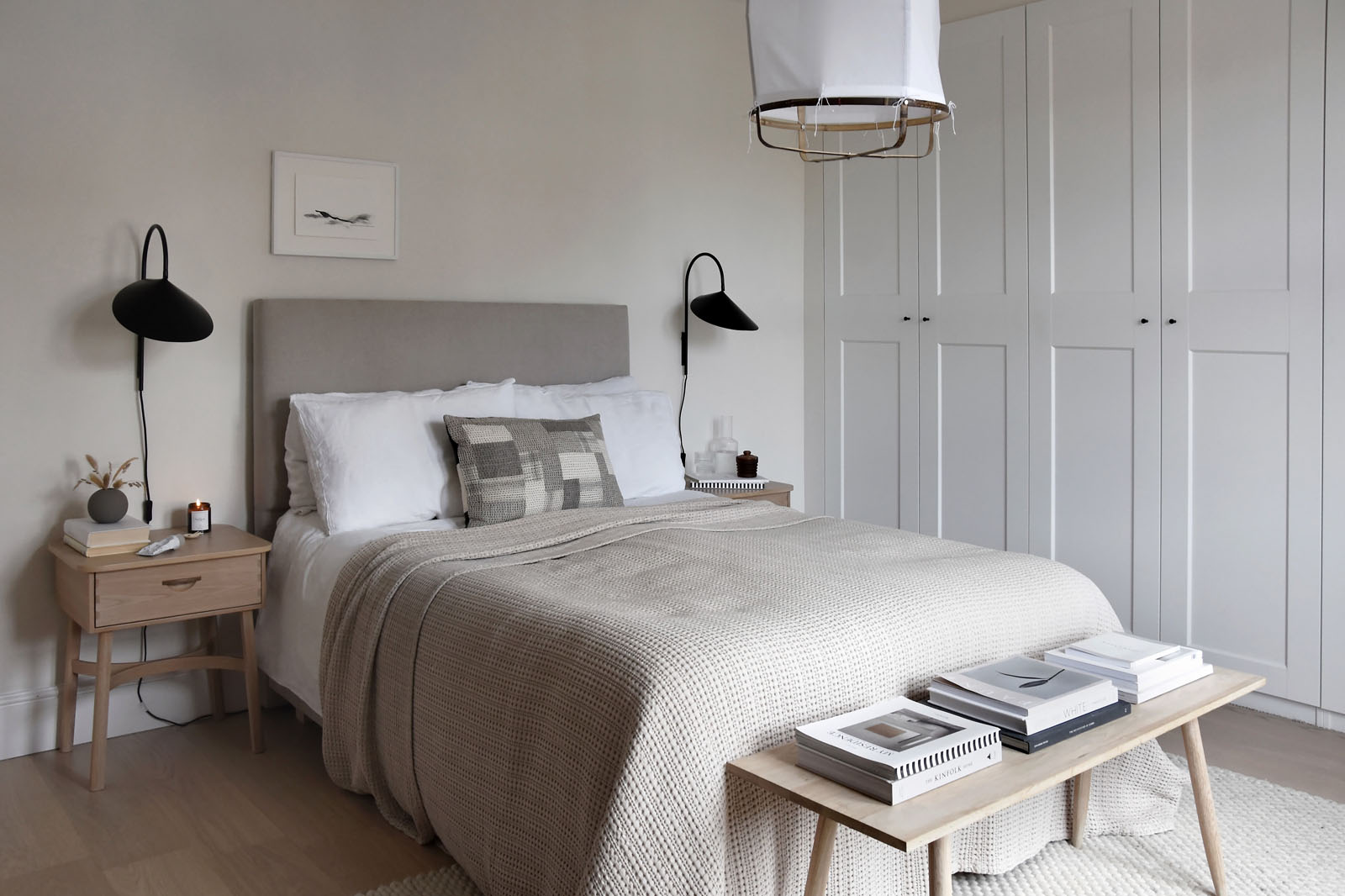 Minimalist beige bedroom with pale oak flooring | These Four Walls blog