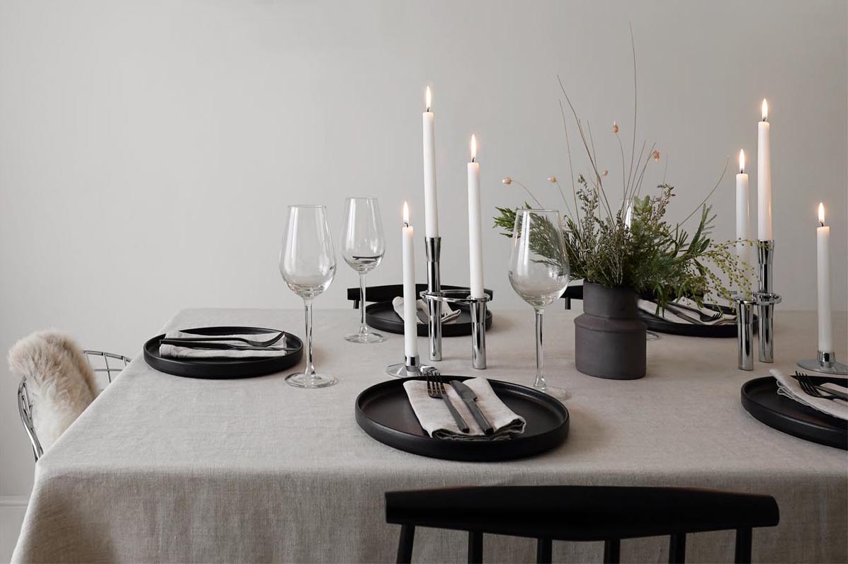 Minimalist Christmas table styling with natural foliage, beige linen and candles | These Four Walls blog