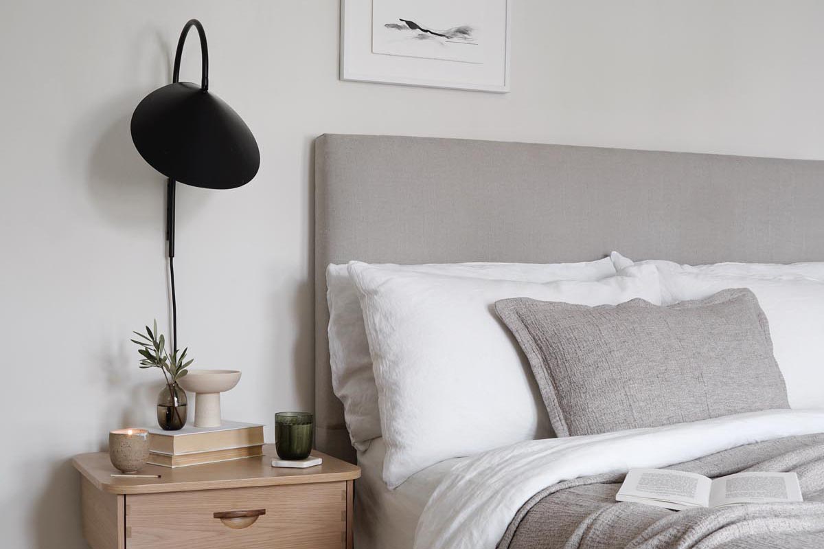 Calm, cosy bedroom with neutral white and beige decor | The Edit - everything you need for a good night's sleep | These Four Walls blog