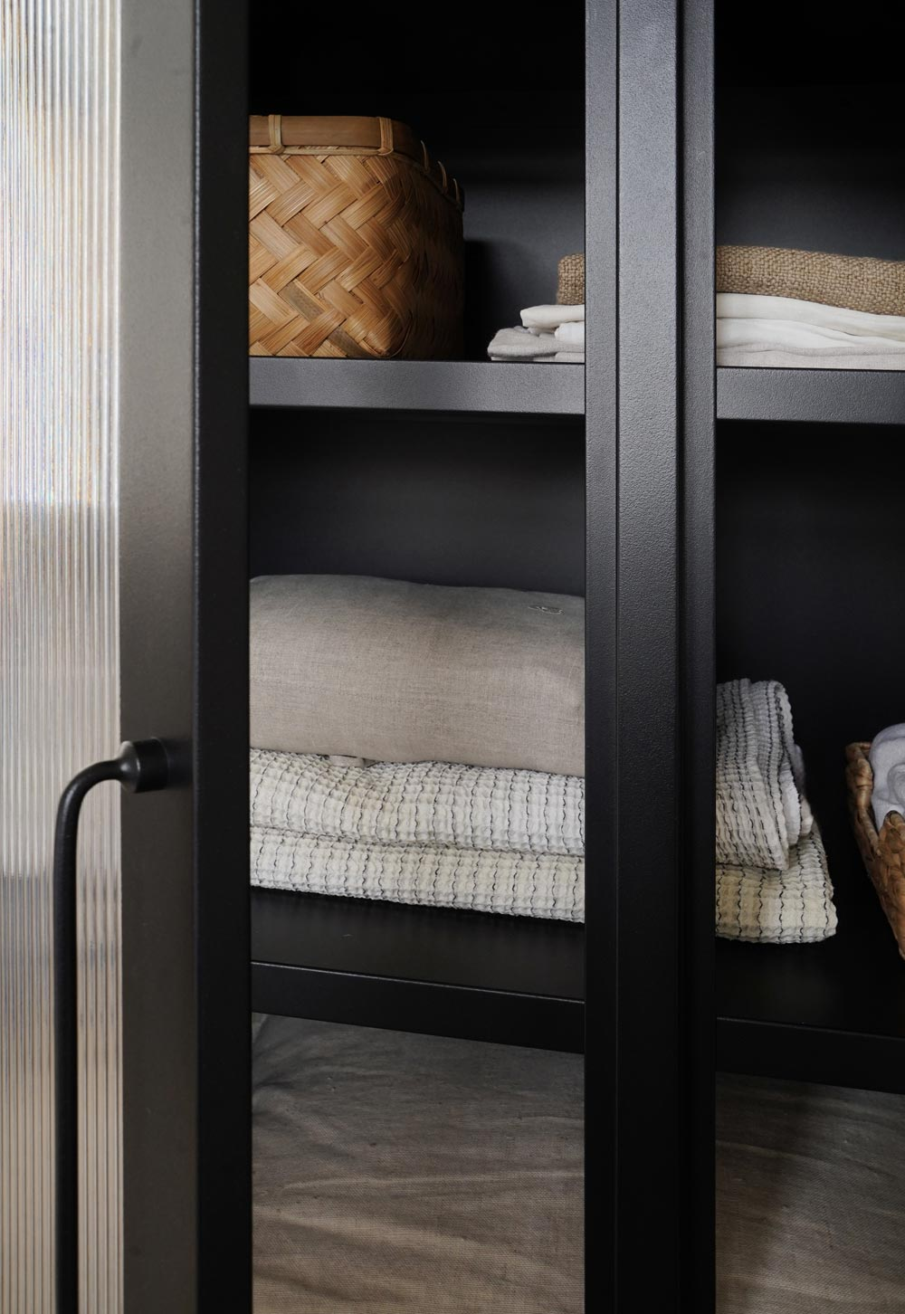 Black reed-fronted linen cupboard from Bisley | These Four Walls blog