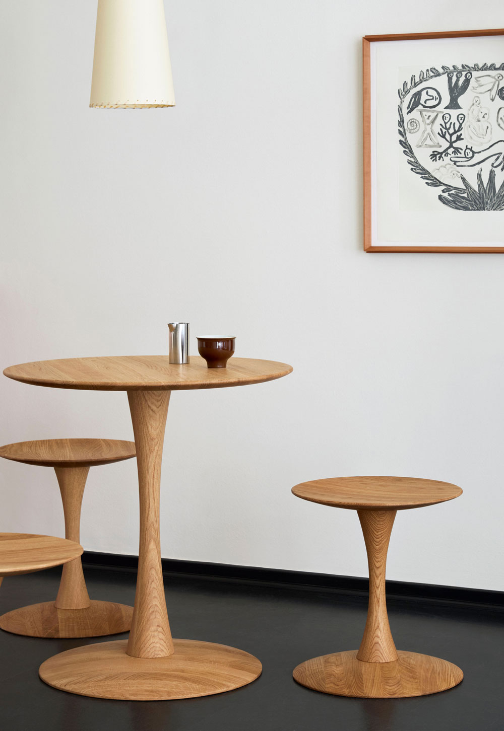 Minimalist interior with circular oak table and stools from Frederica's 'Trisse' collection, designed by Nanna Ditzel | New design finds - July 2026 | These Four Walls blog