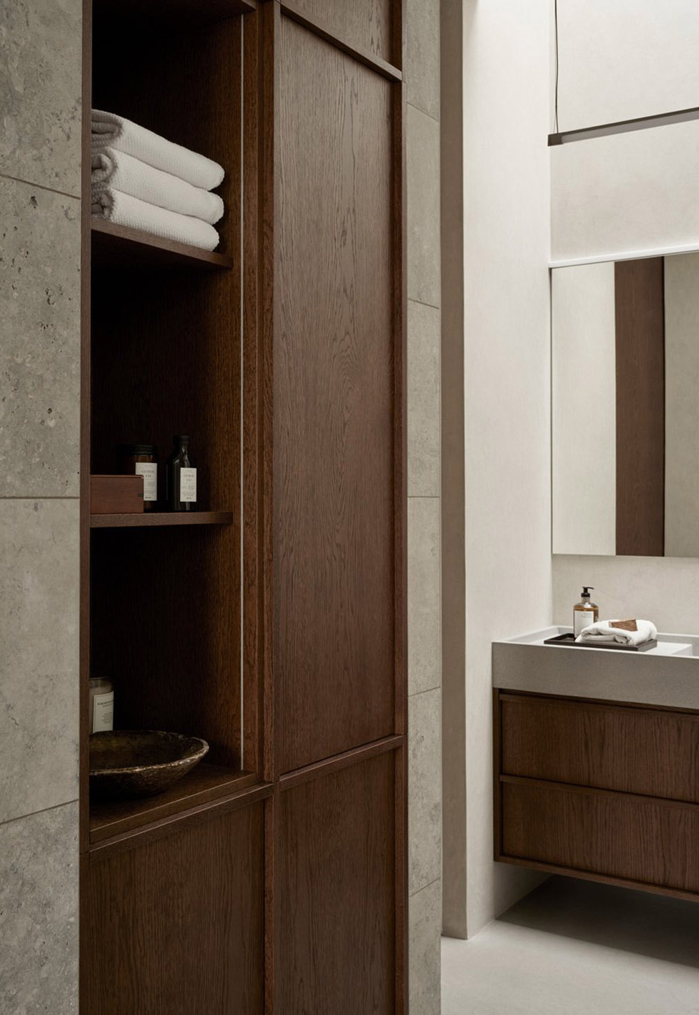 Minimalist bathroom with stone basin and dark wood vanity unit and cupboard from Nordiska Kök's new 'Bath' collection | New design finds - July 2026 | These Four Walls blog