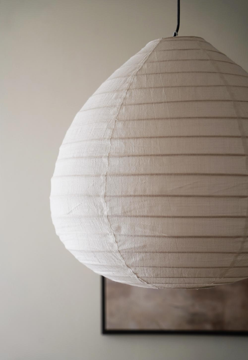 Linen pendant light in a rustic-minimalist cottage interior | These Four Walls blog
